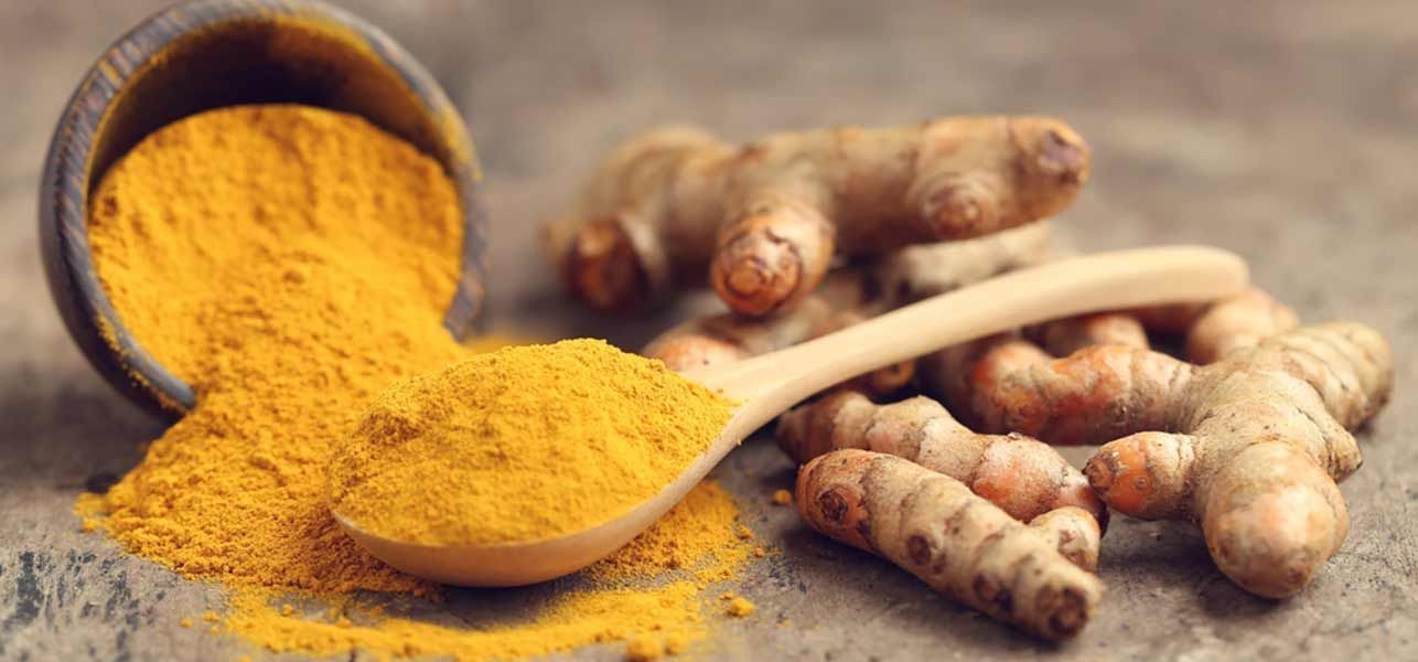 What does curcumin do as a food additive?